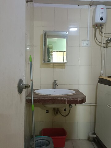 Bathroom in 2 BHK Apartment at Royal Palms Garden View, Goregaon East – for Rent