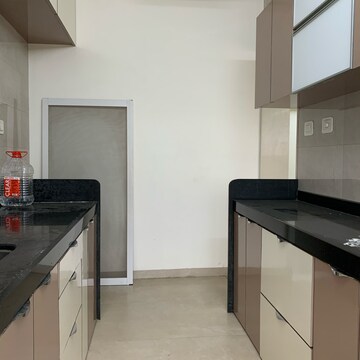 Kitchen in 2 BHK Apartment at Paradigm Ananda Residency, Babhai Naka – for Sale