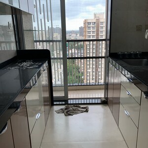 Kitchen in 2 BHK Apartment at Paradigm Ananda Residency, Babhai Naka – for Sale