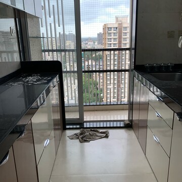 Kitchen in 2 BHK Apartment at Paradigm Ananda Residency, Babhai Naka – for Sale