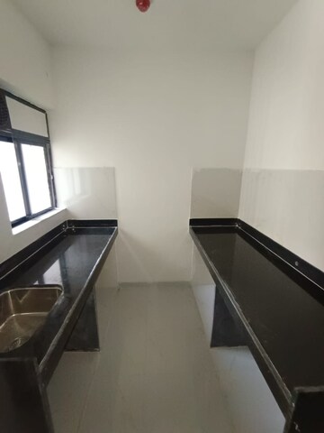 Kitchen in 1 BHK Apartment at Runwal Gardens, Dombivli East – for Rent
