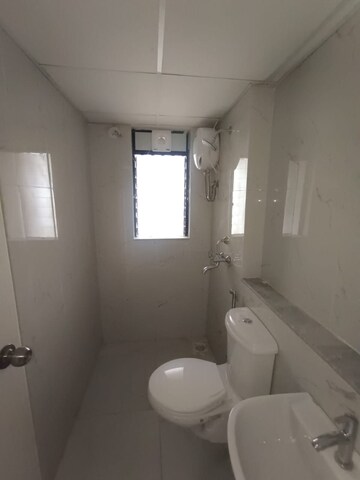 Bathroom in 1 BHK Apartment at Runwal Gardens Phase 2, Dombivli East – for Rent