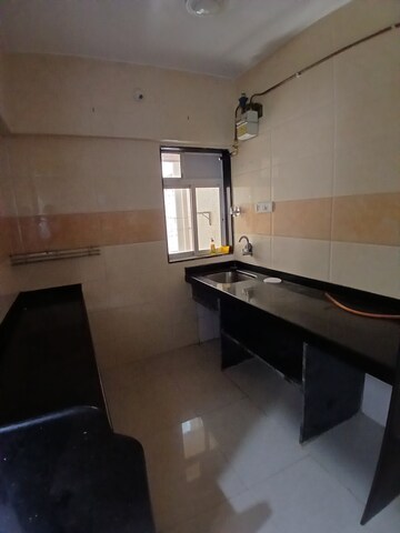Kitchen in 1 BHK Apartment at Glasswood And Lucky Vishwa Villa, Malad West – for Rent