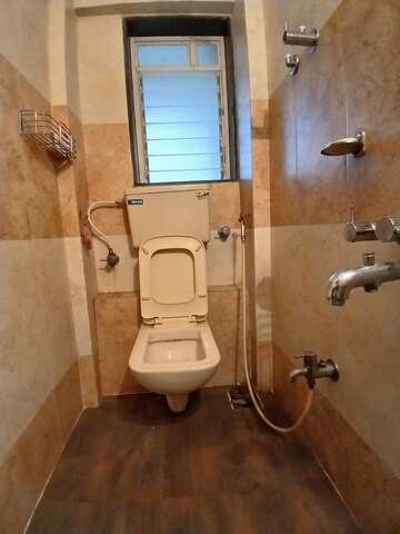 Living Room in 1 BHK Apartment at Glasswood And Lucky Vishwa Villa, Malad West – for Rent