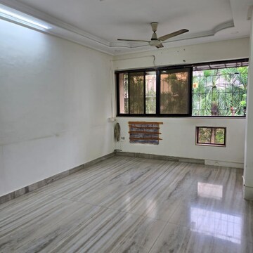 Living Room in 2 BHK Apartment at Sukh Sagar CHS Kandivali, Govind Dalvi Nagar – for Rent