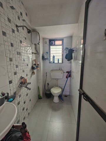 Bathroom in 1 BHK Apartment at Tulip Garden Seawoods, Seawoods – for Rent