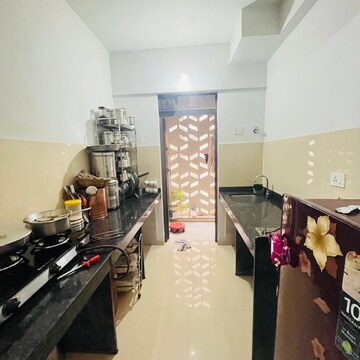 Kitchen in 2 BHK Apartment at Lodha Palava Downtown, Taloja Bypass Road – for Rent