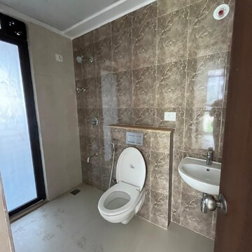 Bathroom in 1 BHK Apartment at Lodha Palava Downtown, Taloja Bypass Road – for Rent