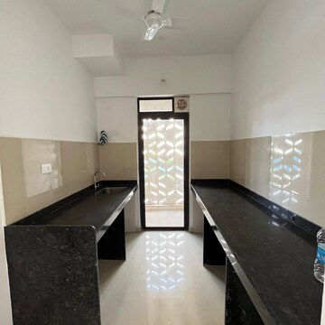 Kitchen in 2 BHK Apartment at Lodha Palava Downtown, Taloja Bypass Road – for Rent