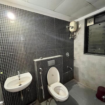 Bathroom in 2 BHK Apartment at Lodha Palava Downtown, Taloja Bypass Road – for Rent