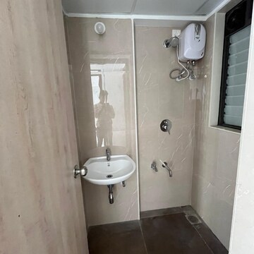 Bathroom in 1 BHK Apartment at Lodha Palava Downtown, Taloja Bypass Road – for Rent