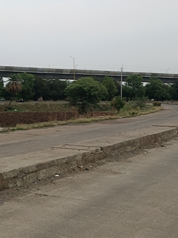 Plot Area in  Land at Super Corridor – for Sale