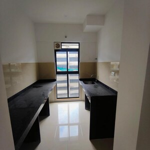 Team Area in 1 BHK Apartment at Lodha Palava Downtown, Taloja Bypass Road – for Sale