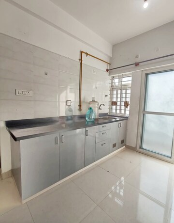 Kitchen in 3 BHK Apartment at Abhilash Enclave, Beach Road – for Sale