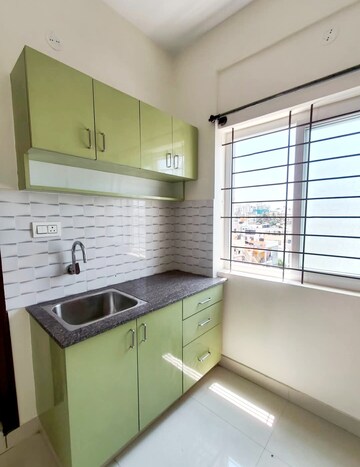 Kitchen in 3 BHK Apartment at Abhilash Enclave, Beach Road – for Sale