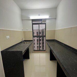 Kitchen in 1 BHK Apartment at Lodha Palava Downtown, Taloja Bypass Road – for Sale
