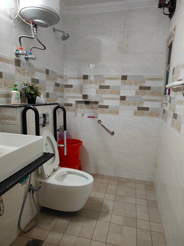 Bathroom in 3 BHK Apartment at Sarita Vihar – for Rent