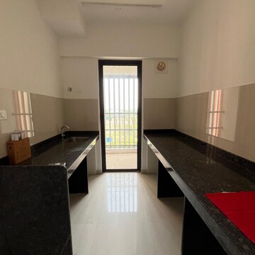 Kitchen in 1 BHK Apartment at Lodha Palava Downtown, Taloja Bypass Road – for Rent