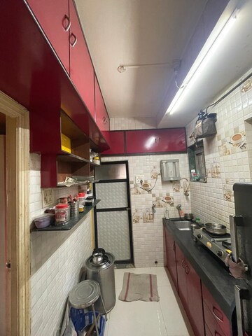 Kitchen in 1 BHK Apartment at Divya Smith Chs, Kandivali West – for Sale