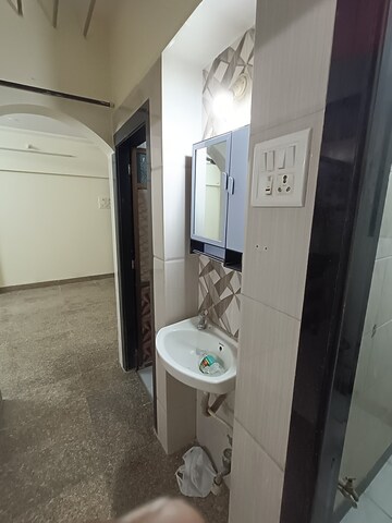 Bathroom in 2 BHK Apartment at Charkop Sector 3 – for Rent