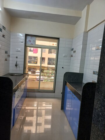 Kitchen in 2 BHK Apartment at Mahavir Darshan, Virar West – for Sale