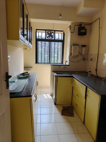 Kitchen in 2 BHK Apartment at Hiranandani Estate Capri, Ghodbunder Road – for Sale