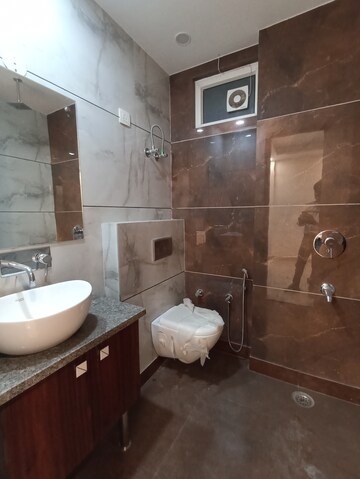 Bathroom in 3 BHK Apartment at Sunder Apartment, Paschim Vihar – for Rent