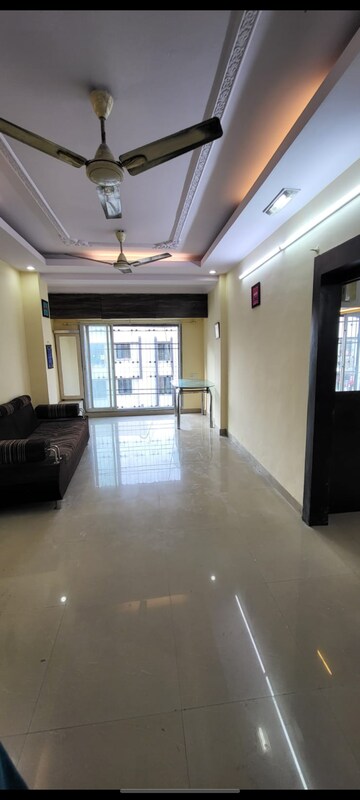 Living Room in 2 BHK Apartment at Manorath CHS Borivali, Borivali West – for Rent