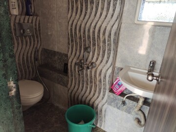 Bathroom in 1 BHK Apartment at Man Opus, Mira Road – for Rent