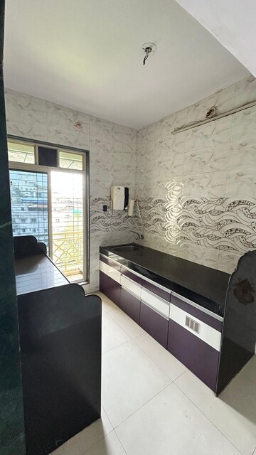 Kitchen in 1 BHK Apartment at Rajiv Thakur Jai Santoshi Mata Heights, Dombivli East – for Sale