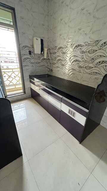 Kitchen in 1 BHK Apartment at Rajiv Thakur Jai Santoshi Mata Heights, Dombivli East – for Sale