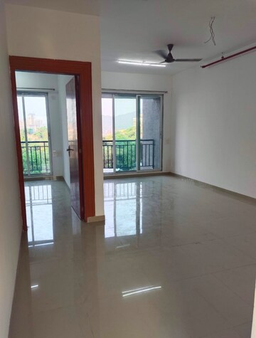 Living Room in 2 BHK Apartment at Tanvi Eminence, Mira Road – for Rent