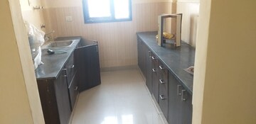 Kitchen in 2 BHK Apartment at Cosmos Greens, Alwar Bypass Road – for Sale