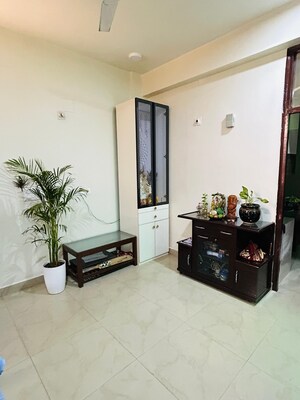 Living Room in 2 BHK Apartment at Crossing Republik, Crossing Republic – for Sale