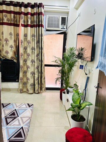Living Room in 2 BHK Apartment at Crossing Republik, Crossing Republic – for Sale