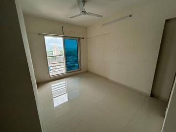 Master Bedroom in 2 BHK Apartment at Romell Allure, Borivali East – for Rent