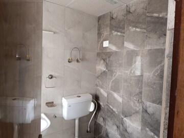 Bathroom in 2 BHK Apartment at Pivotal Riddhi Siddhi, Sector 99 – for Rent