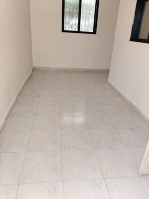 Living Room in 1 BHK Apartment at Janhavi CHS Kothrud, Kothrud – for Sale