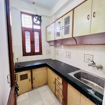 Kitchen in 2 BHK Builder Floor at Khirki Extension – for Rent