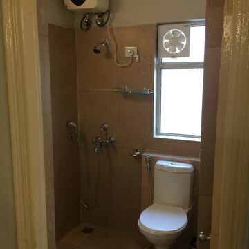 Bathroom in 1 BHK Apartment at Paras Tierea Studio Apartments, Sector 137 – for Rent