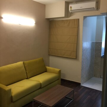 Living Room in 1 BHK Apartment at Paras Tierea Studio Apartments, Sector 137 – for Rent
