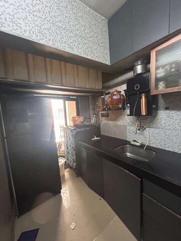 Kitchen in 2 BHK Apartment at Palash Towers, Andheri West – for Rent