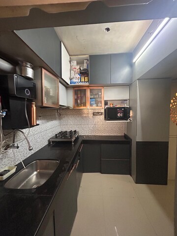 Kitchen in 2 BHK Apartment at Palash Towers, Andheri West – for Rent