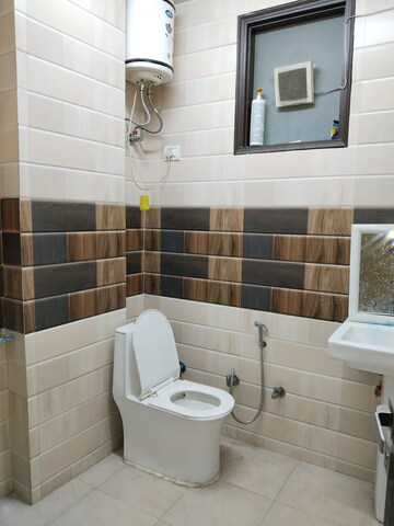 Bathroom in 2 BHK Apartment at Khirki Extension – for Rent