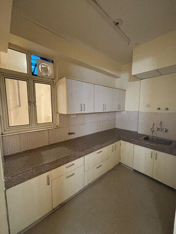 Kitchen in 2 BHK Apartment at Supertech Eco Suites, Sector 137 – for Rent