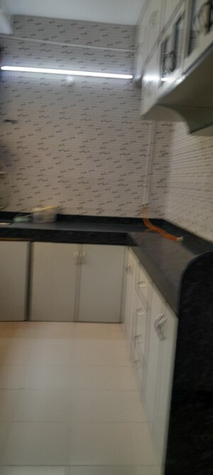 Kitchen in 2 BHK Apartment at Vasant Sagar, Kandivali East – for Sale