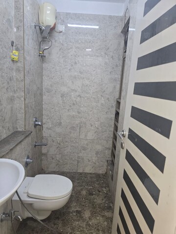 Bathroom in 1 BHK Apartment at Sheth Vasant Oasis, Andheri East – for Rent