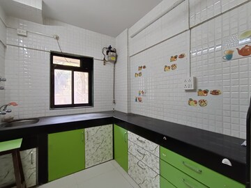 Kitchen in 1 BHK Apartment at Asmita Mogra CHS, Andheri East – for Rent