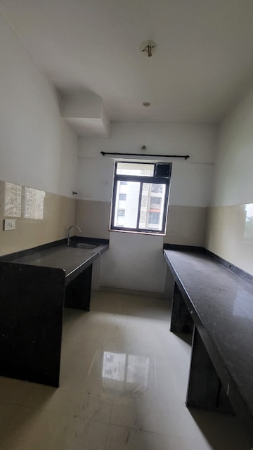 Kitchen in 1 BHK Apartment at Lodha Palava Downtown, Dombivli East – for Rent