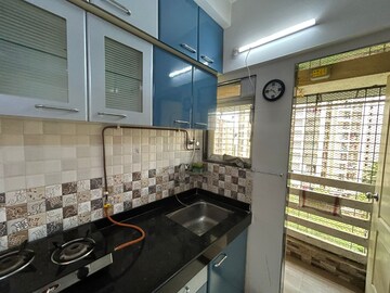 Kitchen in 1 BHK Apartment at Cosmos Enclave, Kasarvadavali – for Rent